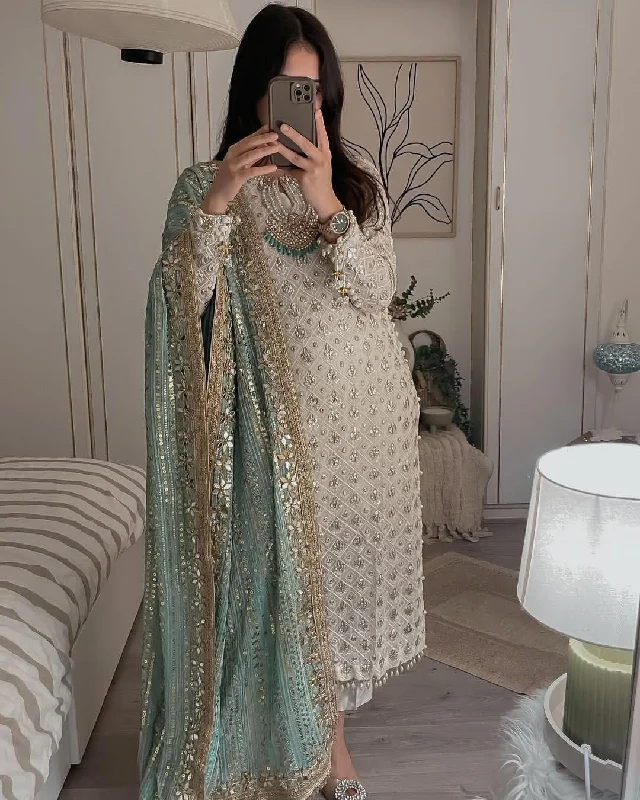 Glittering Charm Eid Dresses: Georgette Sequined Embroidered Top and Pant Set with Green Dupatta Casual Track Pants Glittering Charm Eid Dresses: Georgette Sequined Embroidered Top and Pant Set with Green Dupatta Casual Track Pants