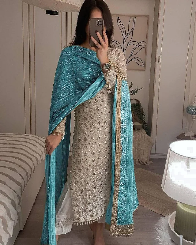 Glittering Charm Eid Dresses: Pakistani Style Georgette Sequined Embroidered Top and Pant Set with Blue Dupatta Comfortable Denim Leggings Glittering Charm Eid Dresses: Pakistani Style Georgette Sequined Embroidered Top and Pant Set with Blue Dupatta Comfortable Denim Leggings