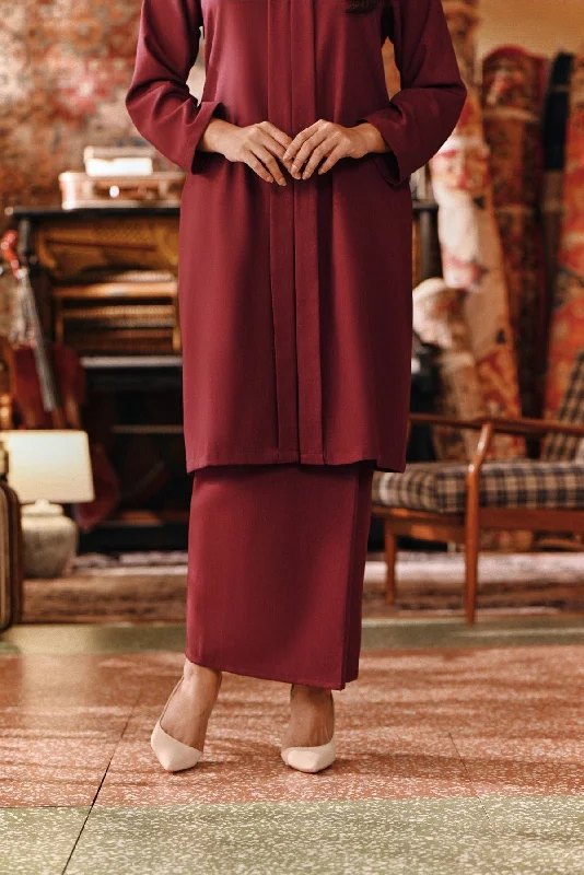 The Akar Kita Women Folded Skirt - Burgundy button skirt front