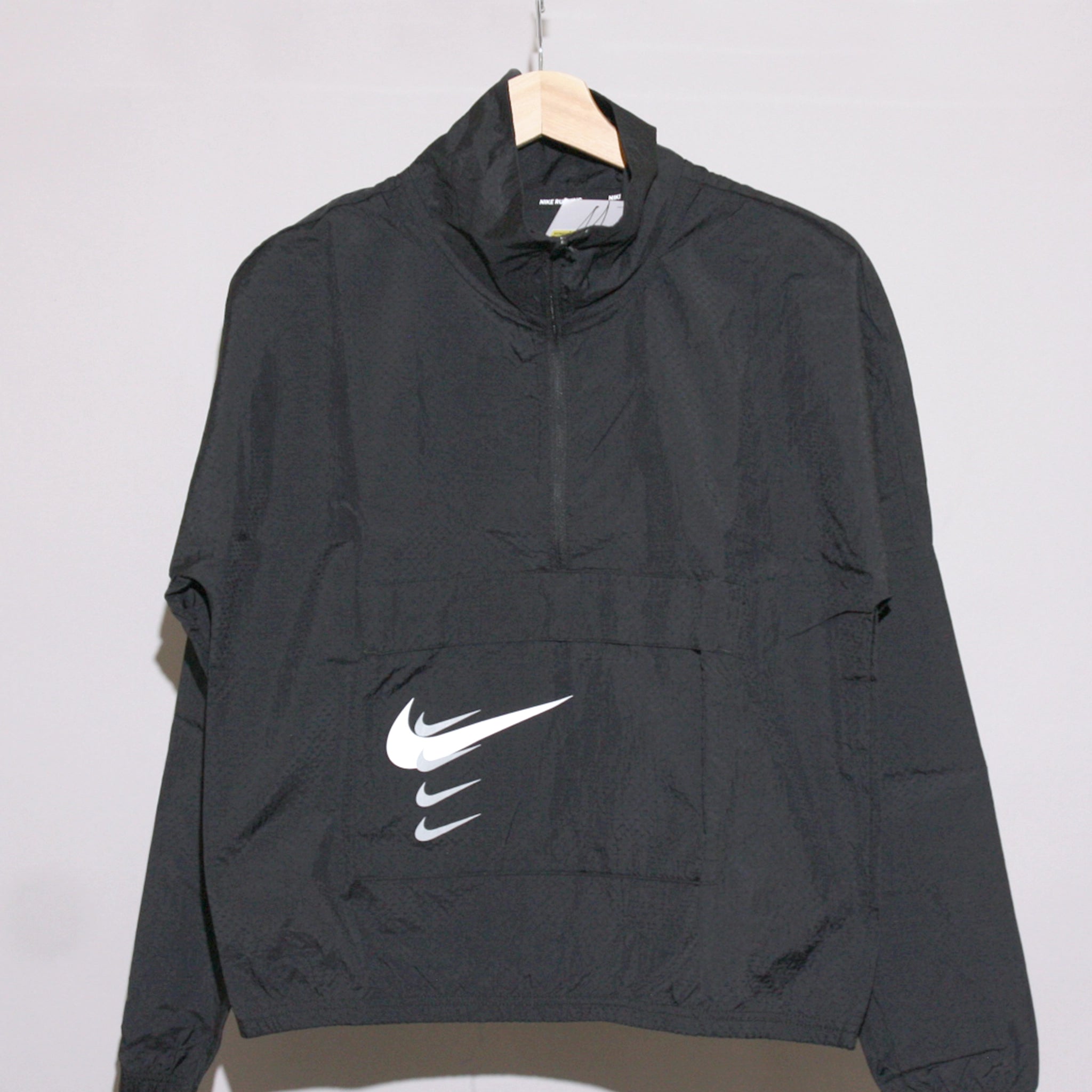 NIKE Women's Swoosh Run 1/2 Zip Running Jacket Front Pockets Side Pockets Patch Pockets NIKE Women's Swoosh Run 1/2 Zip Running Jacket Front Pockets Side Pockets Patch Pockets