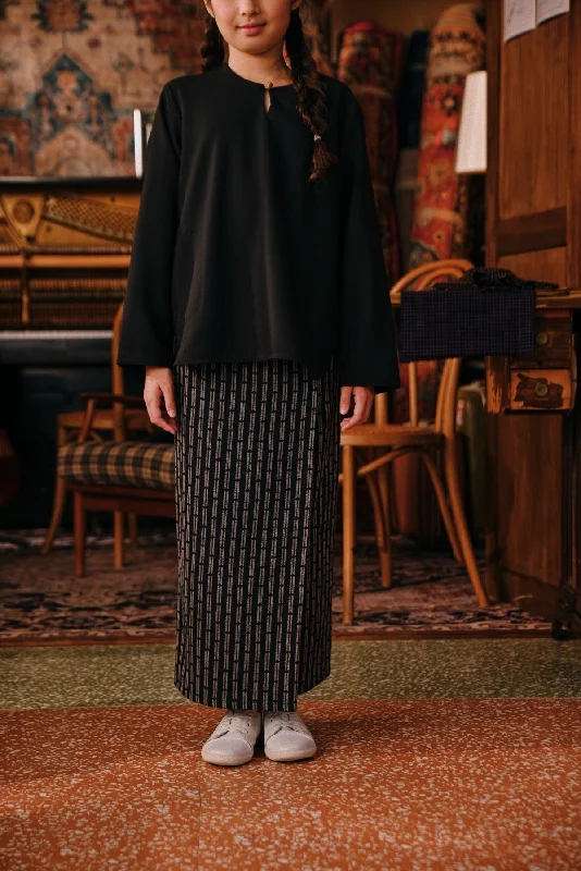 The Akar Kita Folded Skirt - Black Streak leather skirt sleek