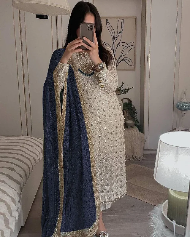 Glittering Charm Eid Dresses: Georgette Sequined Embroidered Top and Pant Set with Navy Blue Dupatta Elegant High-Waist Pants Glittering Charm Eid Dresses: Georgette Sequined Embroidered Top and Pant Set with Navy Blue Dupatta Elegant High-Waist Pants