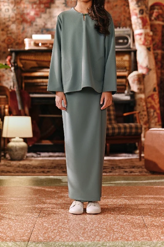 The Akar Kita Folded Skirt - Pine Green leather skirt bold